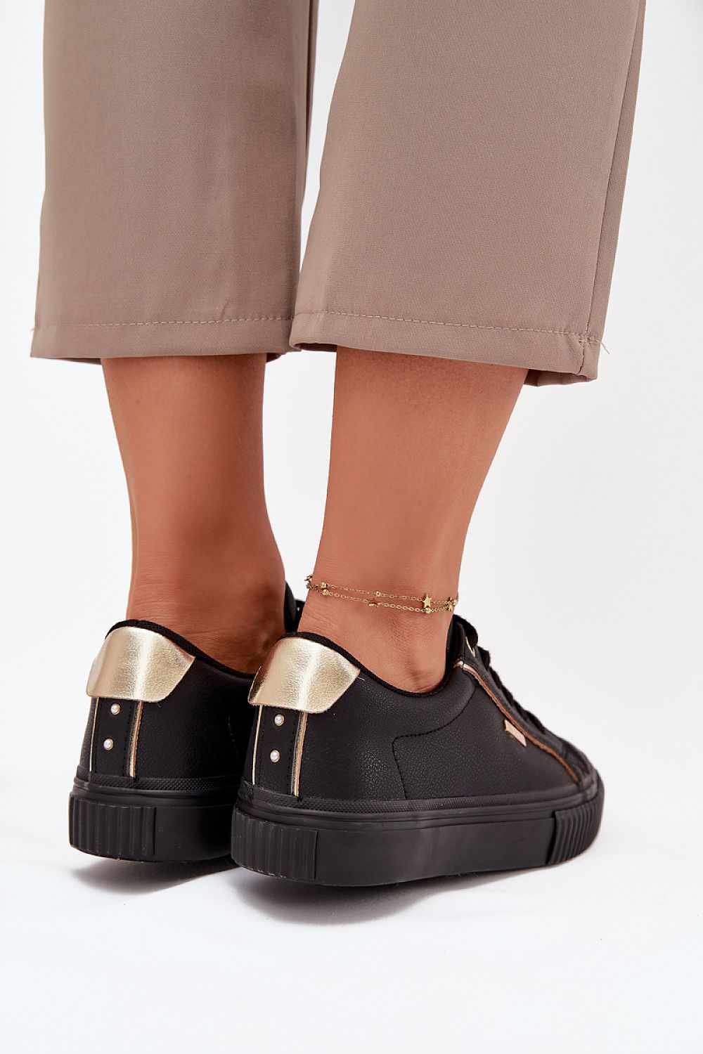 Elegant styling of Women's Big Star Eco Leather Sneakers, highlighting the trendy platform height and versatile look for casual and formal wear, available from Step in Style.