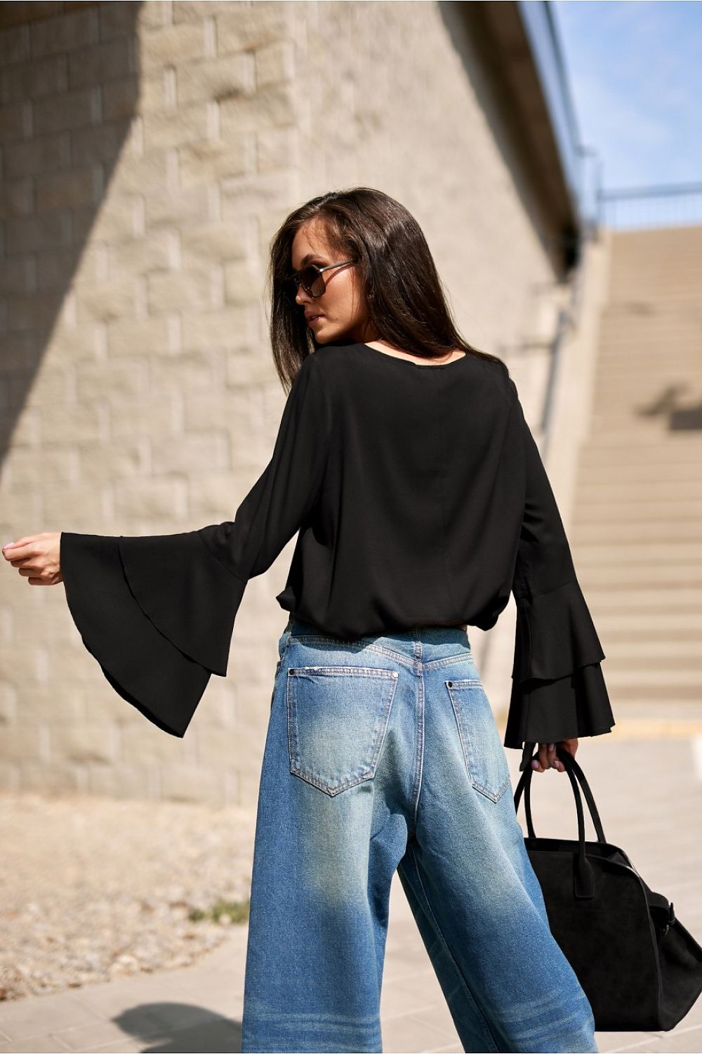 Close-up of the lightweight viscose texture of the Camila Blouse by Roco Fashion, exemplifying comfort and elegance.