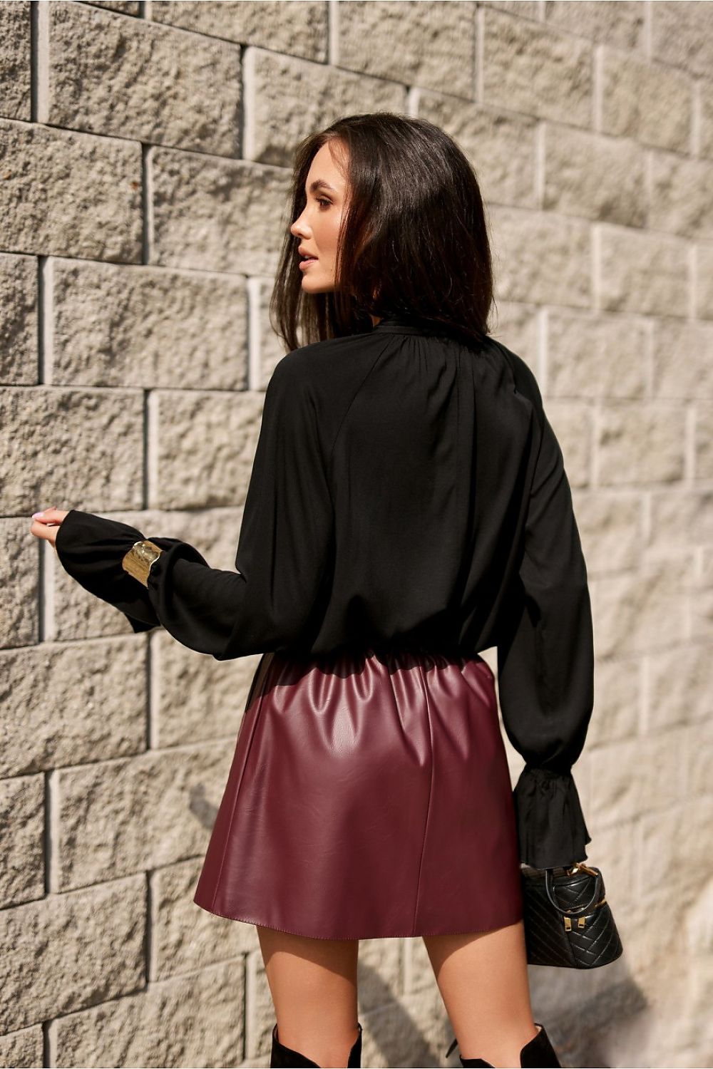 Close-up of the elegant neck tie detail on the Isabel Viscose Blouse from Roco Fashion, highlighting luxury craftsmanship.