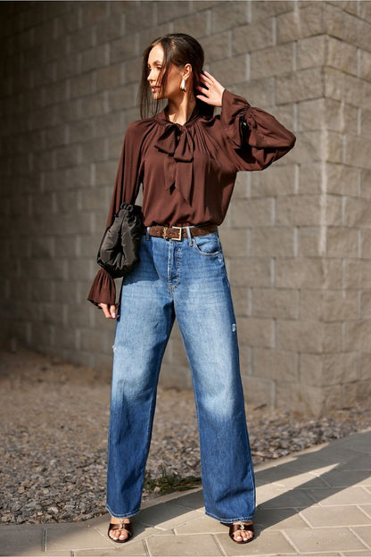 Isabel Elegant Viscose Blouse by Roco Fashion featuring a delicate neck tie and ruffled cuffs, epitomising luxury and sophistication.