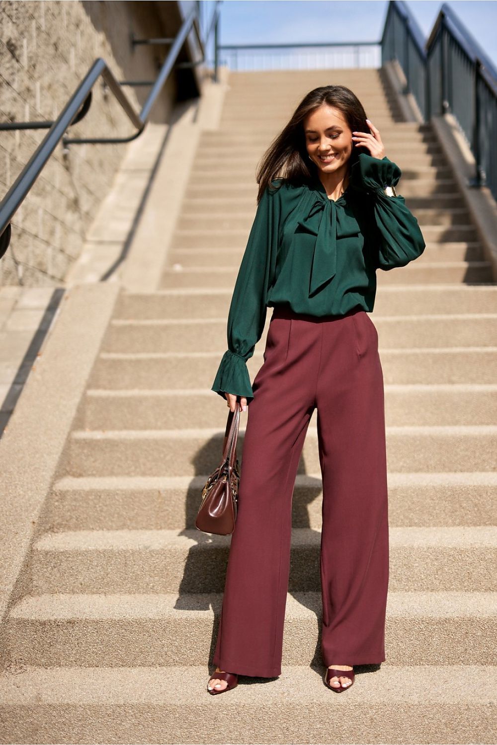 Isabel Viscose Blouse from Roco Fashion in a fashionable setting, illustrating its versatility for evening outfits.