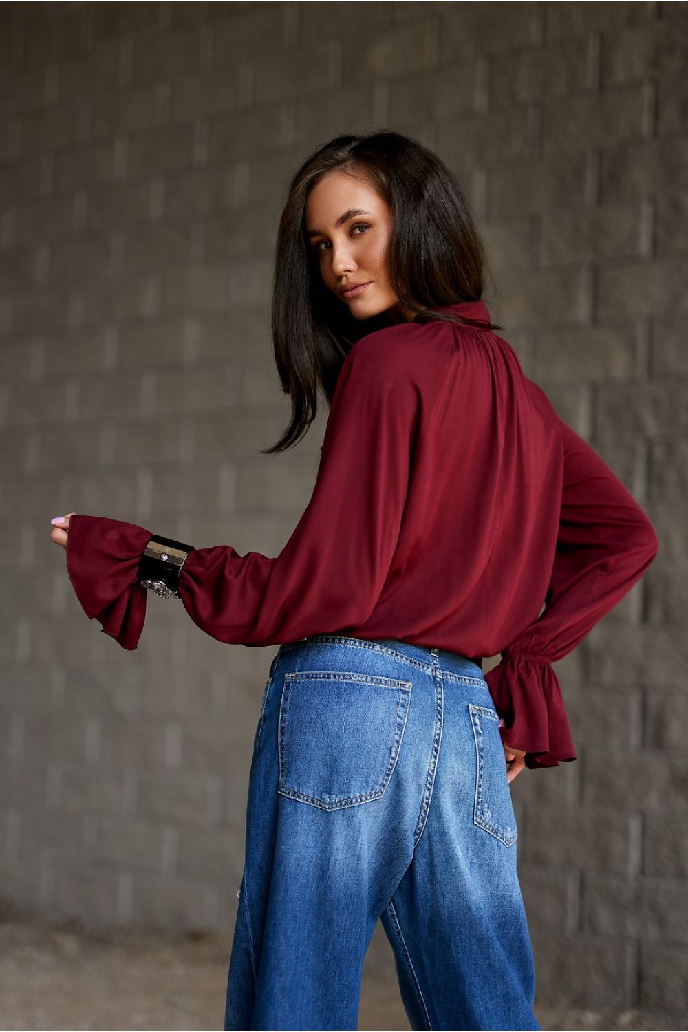 Isabel Elegant Viscose Blouse by Roco Fashion displayed on a hanger, emphasizing its lightweight, breathable fabric and stylish silhouette.