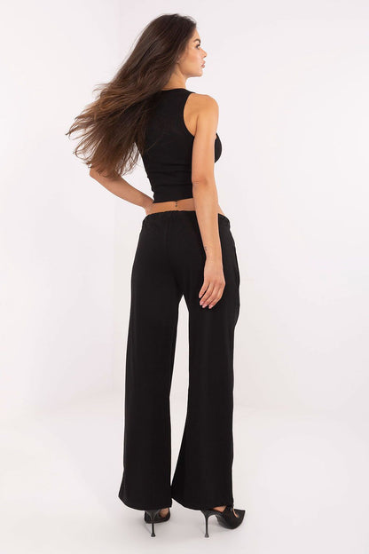 Elegant wide leg tracksuit trousers from Relevance, crafted from durable cotton-polyester blend for a sophisticated, sporty look.