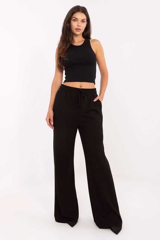 Luxurious high-waisted wide-leg sweatpants with tie waist from Relevance, showcasing a soft viscose-polyester blend for ultimate comfort and style.