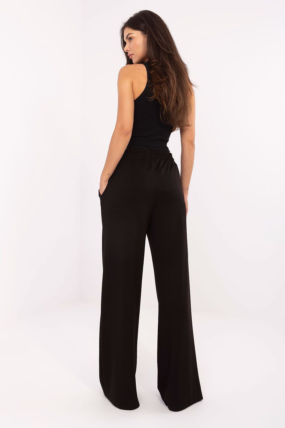 Stylish wide-leg sweatpants with a sophisticated high waist and tie feature by Relevance, made from a premium viscose-polyester blend for a relaxed yet refined look.