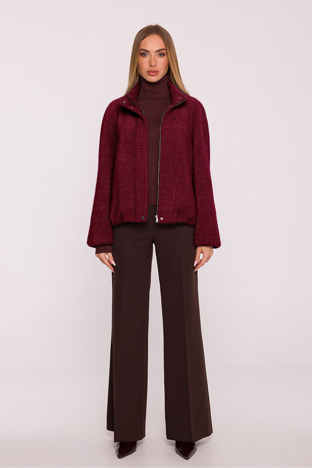 Back view of Moe's stylish oversized women's jacket, demonstrating its loose fit and chic silhouette, ideal for various styling options.