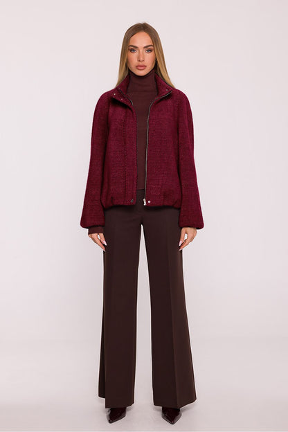 Back view of Moe's stylish oversized women's jacket, demonstrating its loose fit and chic silhouette, ideal for various styling options.