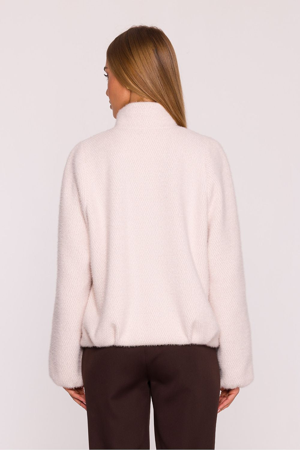 Stylish hip-length women's jacket by Moe, designed in Poland with refined details and a loose fit for ultimate comfort and sophistication.