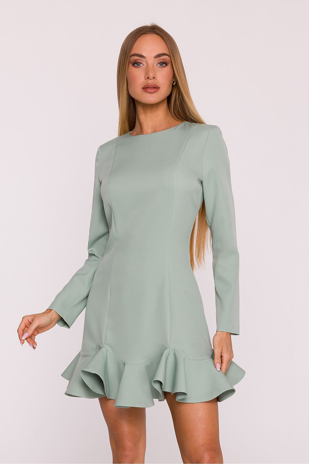 Elegant cocktail dress by Moe featuring a feminine ruffle hem, perfect for upscale events.