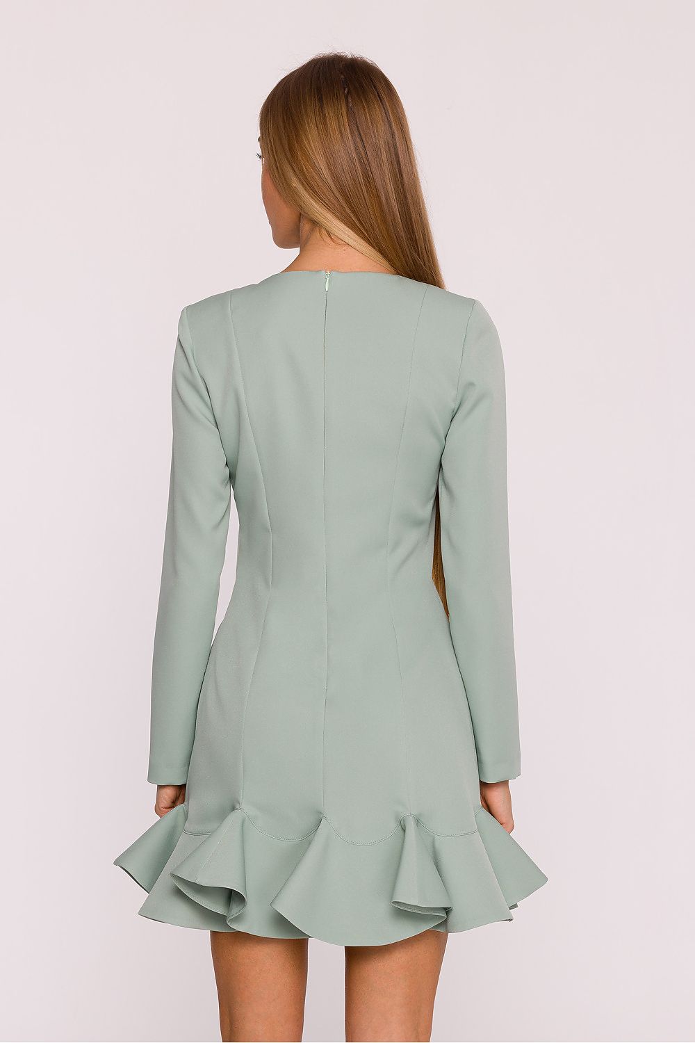 Classy design details of Moe's ruffle hem cocktail dress, showcasing its smooth fabric and elegant silhouette.