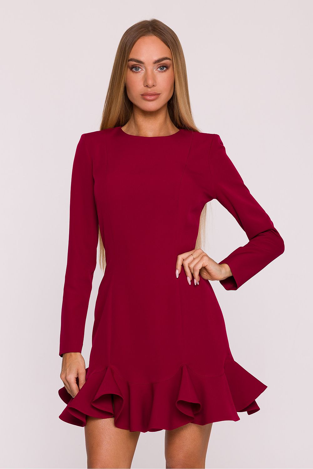 Elegant cocktail dress with ruffle hem by Moe, showcasing smooth fabric and a timeless charm, ideal for special occasions.