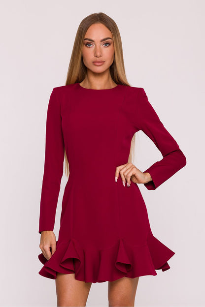 Elegant cocktail dress with ruffle hem by Moe, showcasing smooth fabric and a timeless charm, ideal for special occasions.