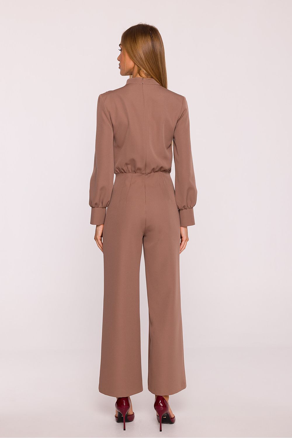 Stylishly designed jumpsuit by Moe, showcasing delicate gathering at the shoulders and wide cuffs, epitomising modern elegance.