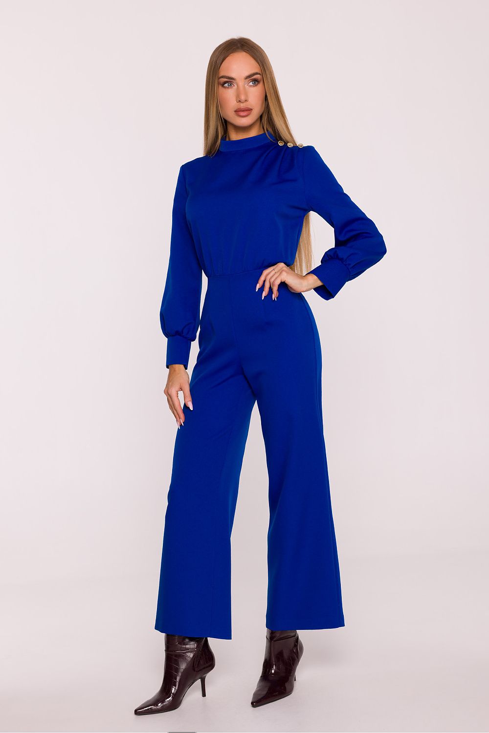 Moe's refined jumpsuit with matte finish, featuring concealed zipper at the back for effortless wear and a chic silhouette.