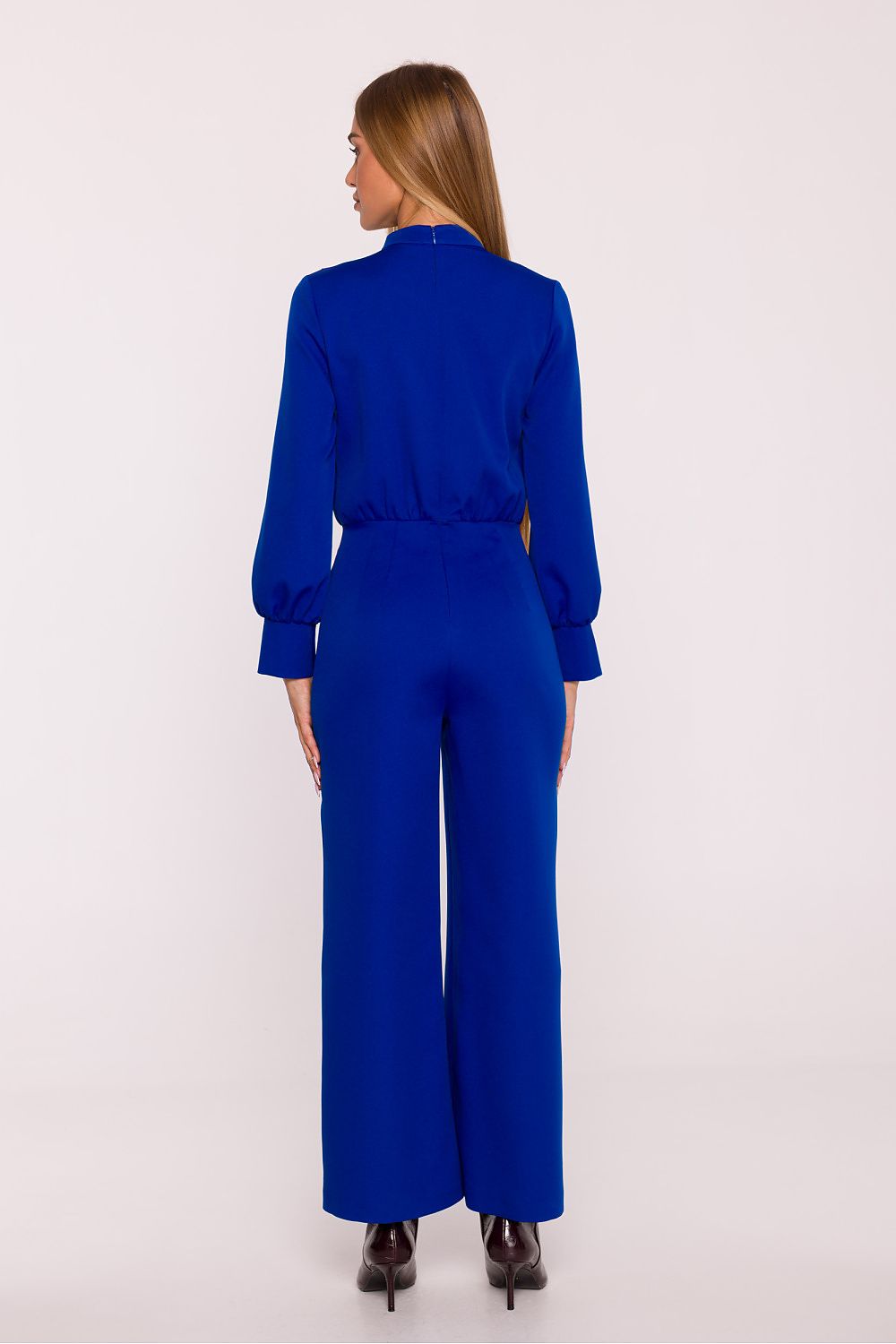 Luxurious jumpsuit by Moe, crafted from lightweight smooth fabric to suit various occasions from casual to formal.