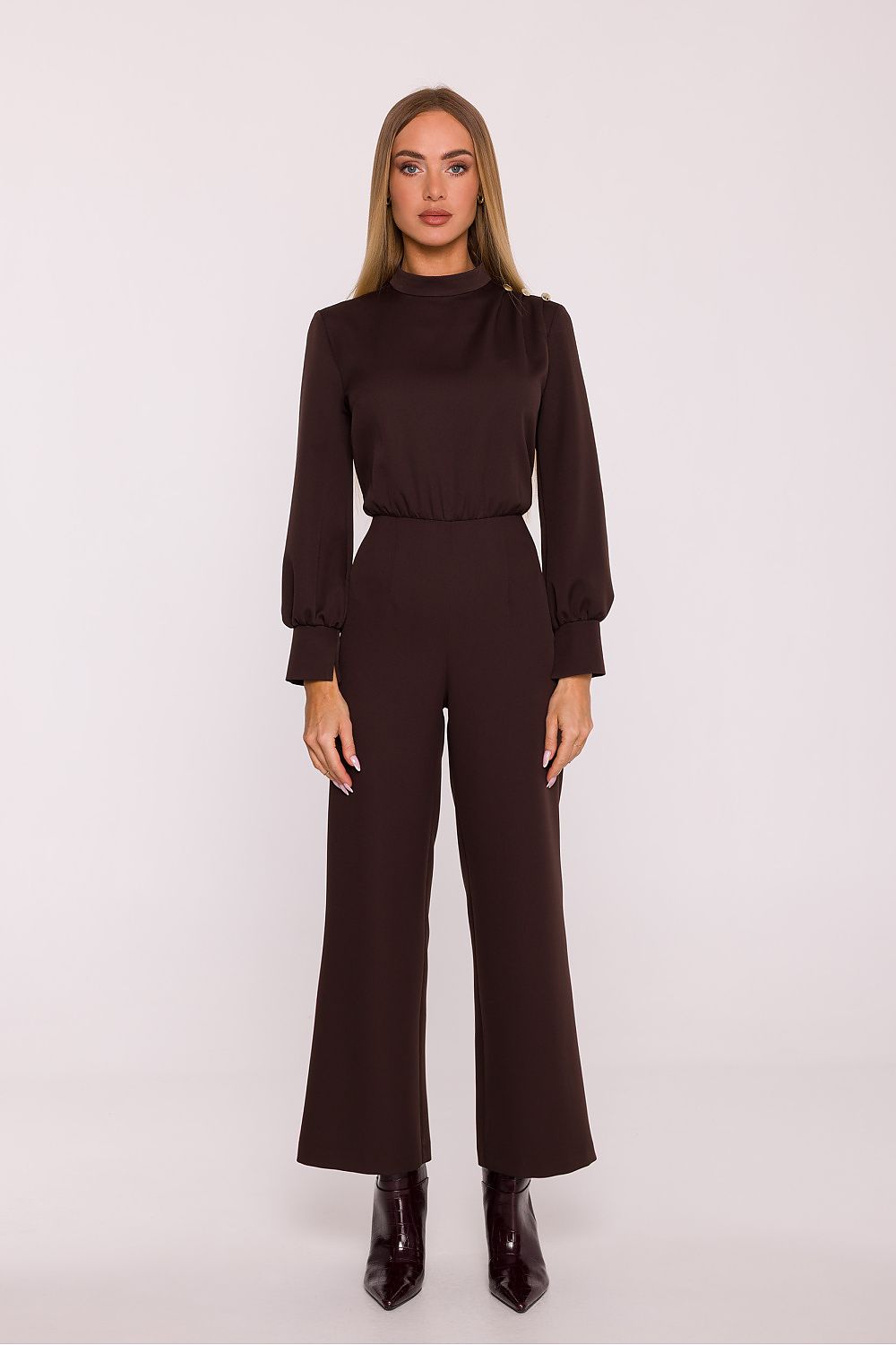 Elegant smooth fabric jumpsuit by Moe showcasing a stand-up collar and fitted waist, perfect for sophisticated occasions.