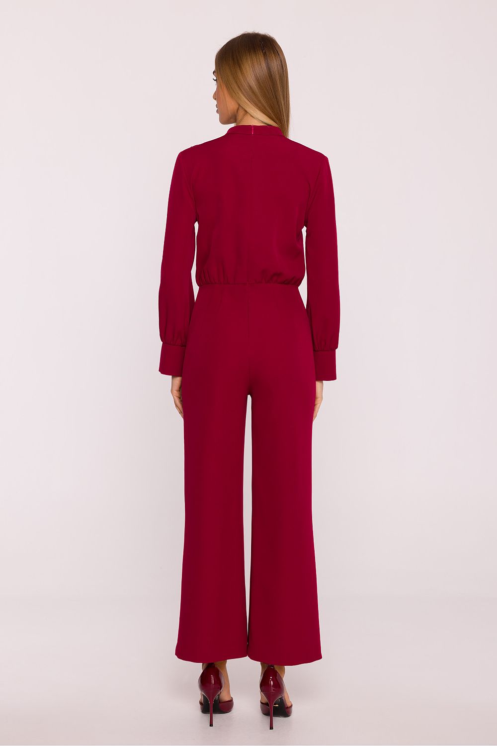 Designer jumpsuit by Moe, highlighting its sleek silhouette and refined fabric, suitable for a variety of occasions, from casual to formal.