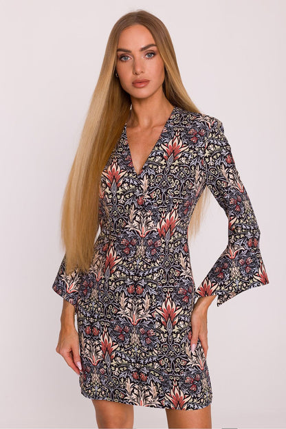 Back view of Moe Floral V-Neck Daydress showcasing the concealed zipper and flowy design, ideal for elegant outings and casual wear.