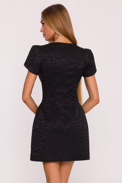 Back view of the elegant Jacquard cocktail dress by Moe, featuring a covered zipper for a chic finish.