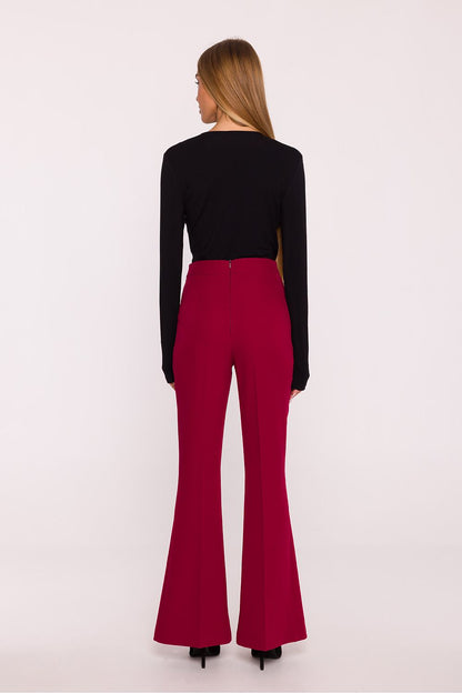 Elegant women's trousers by Moe displayed with flared legs, offering a perfect blend of sophistication and modern style for versatile wardrobe choices.