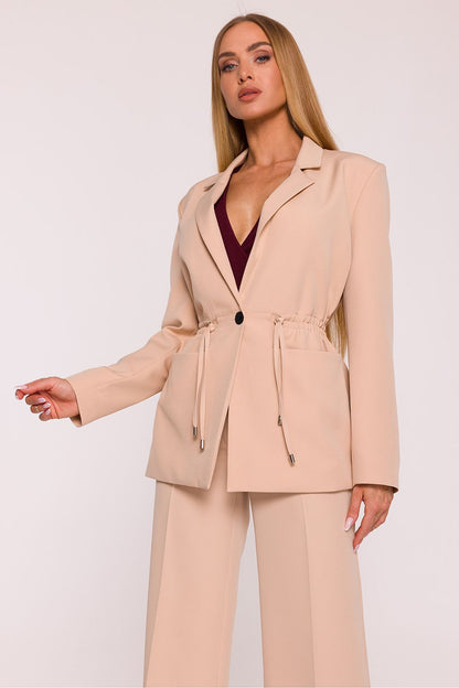 Elegant women's oversized blazer by Moe, showcasing a classic lapel collar and adjustable waist design for a refined silhouette.