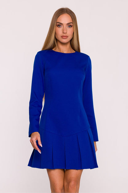 Timeless daydress by Moe featuring a flattering fit with pleats at the bottom, embodying feminine charm and modern sophistication.