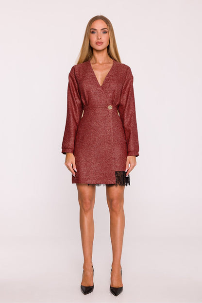 Back view of the Moe daydress, revealing its concealed button fastening and decorative gold button, emphasizing its chic and elegant style.