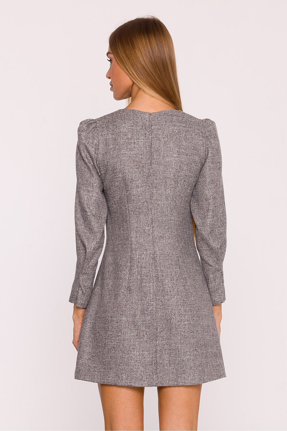 Elegant tweed daydress by Moe featuring a chic boat neckline and long sleeves, perfect for sophisticated occasions.