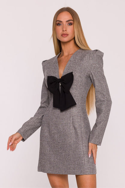 Elegant Moe tweed daydress with puff sleeves and V-neckline, featuring a decorative brooch, perfect for women seeking modern sophistication.