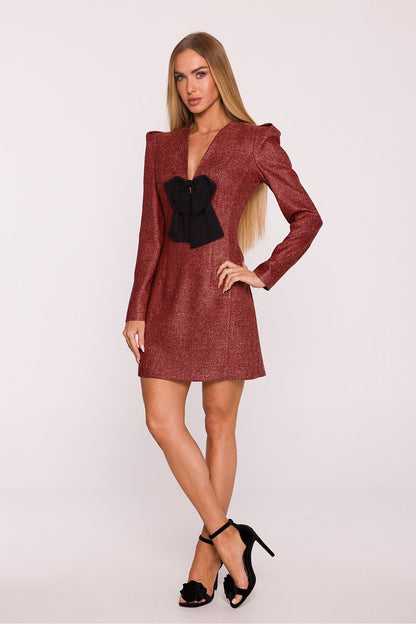 Model wearing Moe's elegant tweed daydress with puff sleeves, demonstrating the flattering silhouette and luxurious fabric perfect for sophisticated occasions.