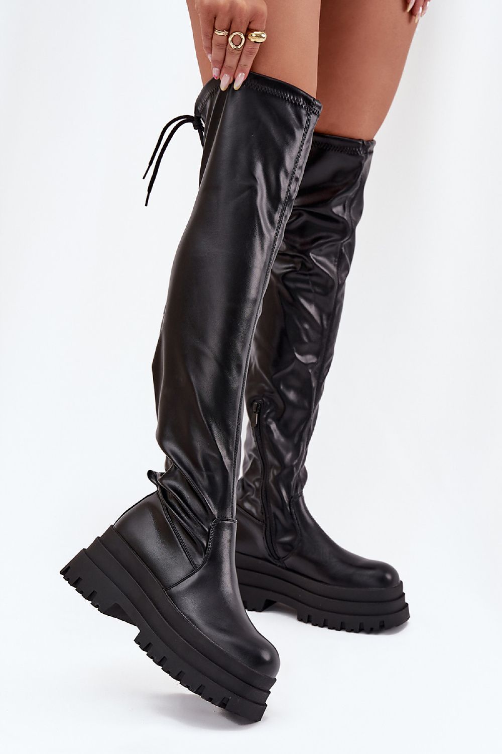 Elegant luxurious knee-high boots by Step in style featuring a 6cm platform, zipper, and drawstring, perfect for winter fashion.