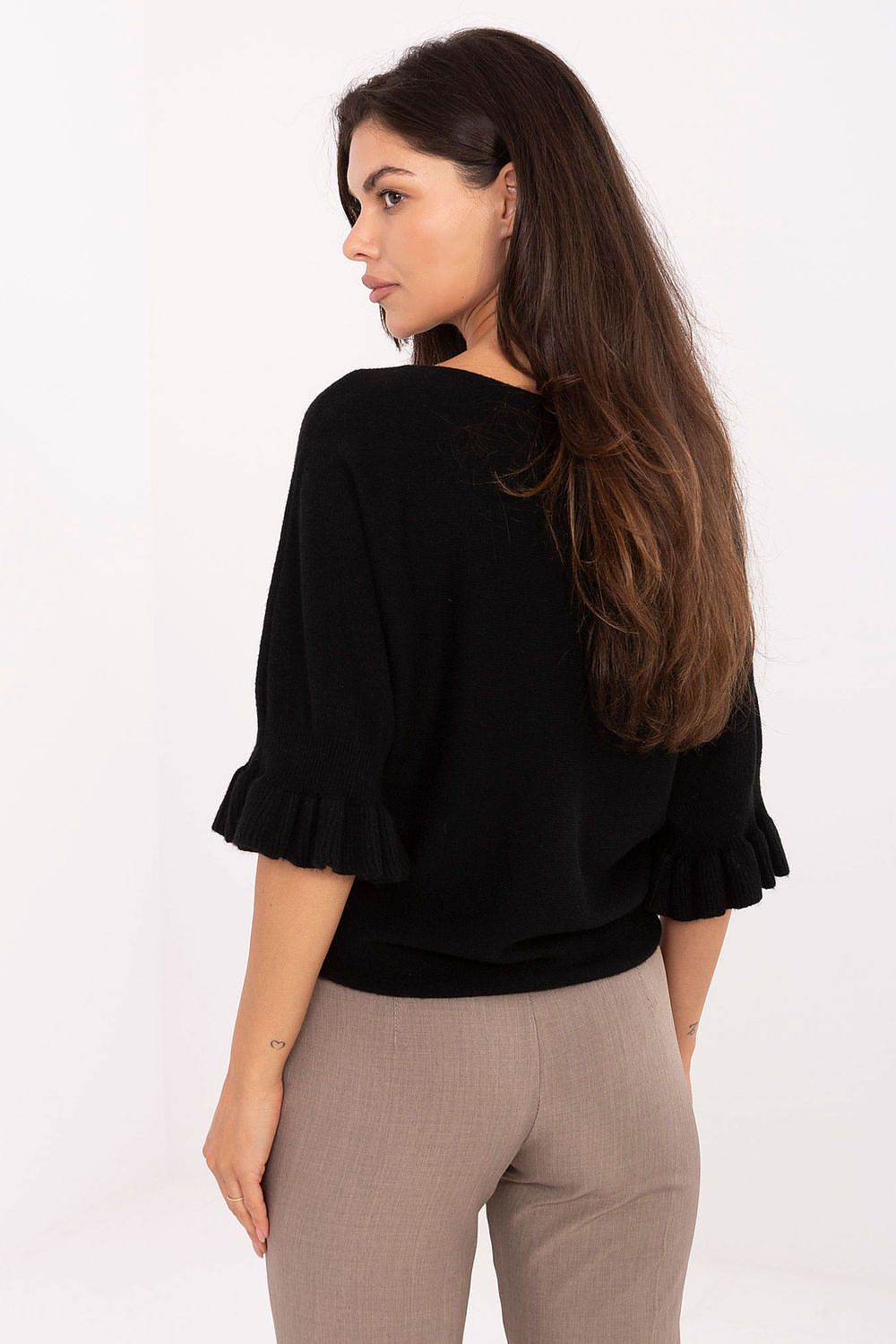 Model wearing Italy Moda's Elegant Women's Jumper, demonstrating its flattering fit and timeless style, ideal for any chic occasion.