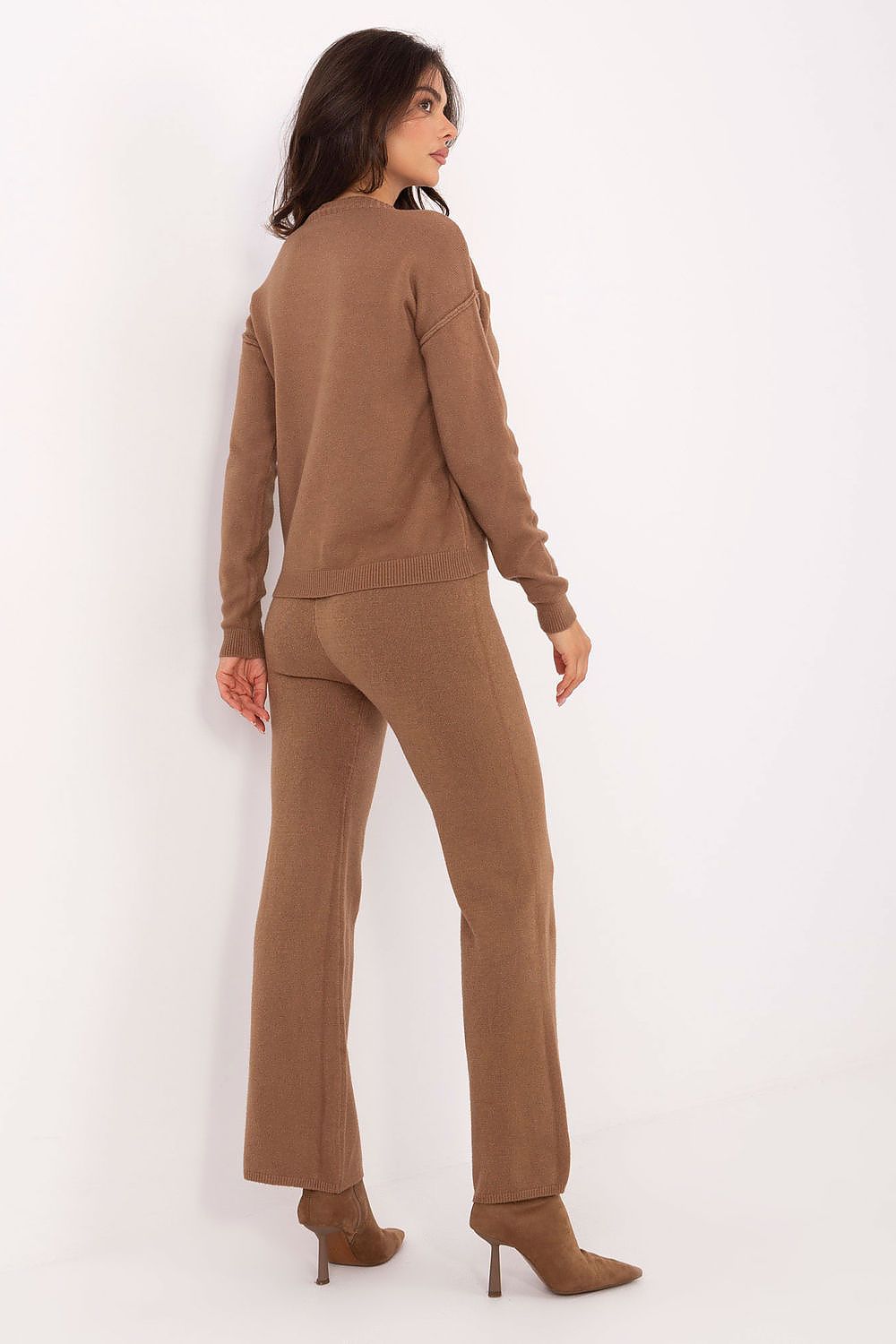 Luxurious Italy Moda casual sweater set featuring a soft viscose blend, elegantly styled with wide leg pants, perfect for chic everyday wear.