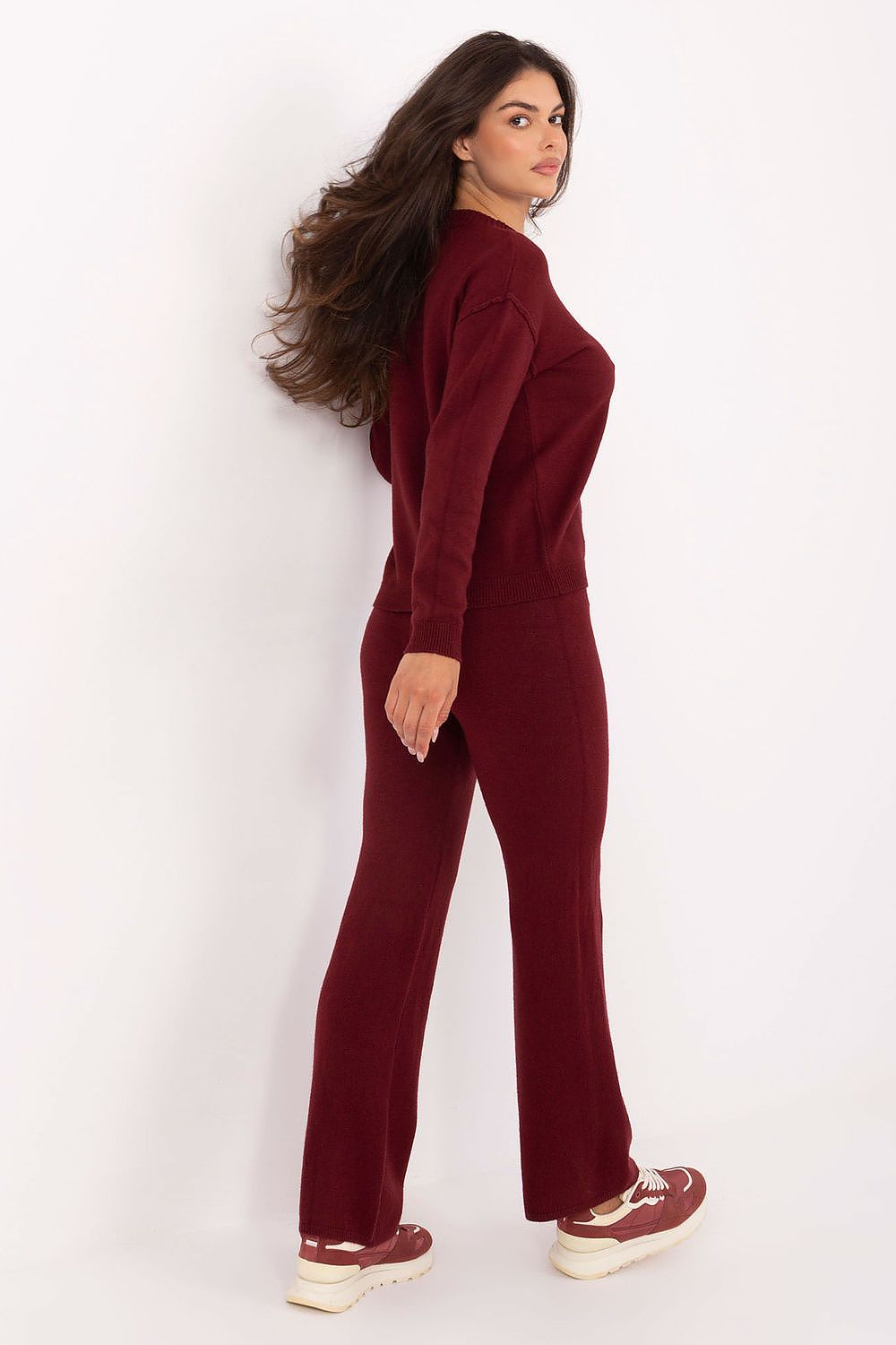 Luxurious Italy Moda casual sweater set featuring a soft viscose blend sweater and wide leg pants, ideal for stylish everyday wear.