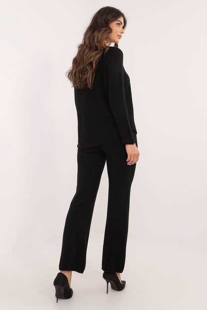 Versatile and stylish women's sweater set by Italy Moda, combining a soft sweater and wide-leg pants, perfect for comfortable yet fashionable everyday attire.