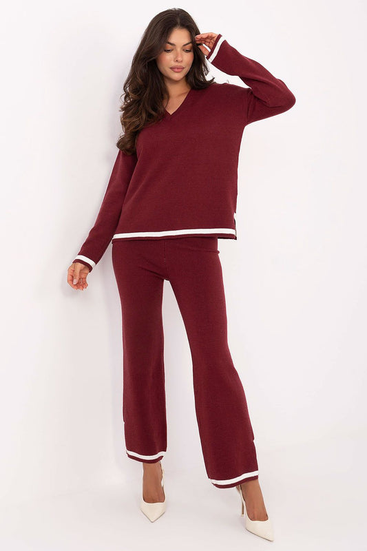 Elegant Italy Moda women's V-neck sweater set paired with high-waisted pants, showcasing a blend of comfort and modern style.