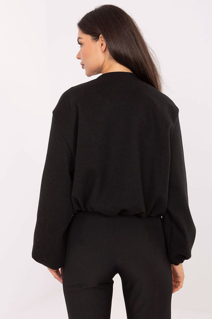 Model wearing the Rue Paris luxurious women's transitional jacket, perfect for everyday wear in the transitional season.