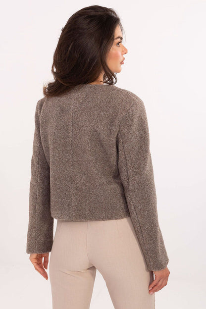 Elegant Rue Paris women's jacket in a professional setting, exemplifying comfort and style for work and formal events.