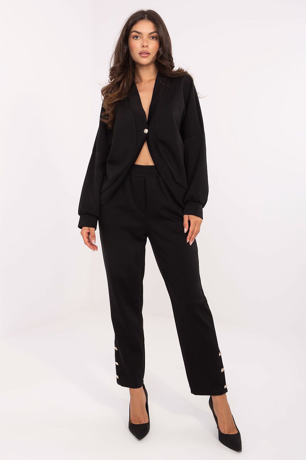 Elegant women's casual viscose set by Rue Paris featuring a soft butter-like fabric, high-waisted trousers, and a stylish V-neck blouse, perfect for everyday elegance.