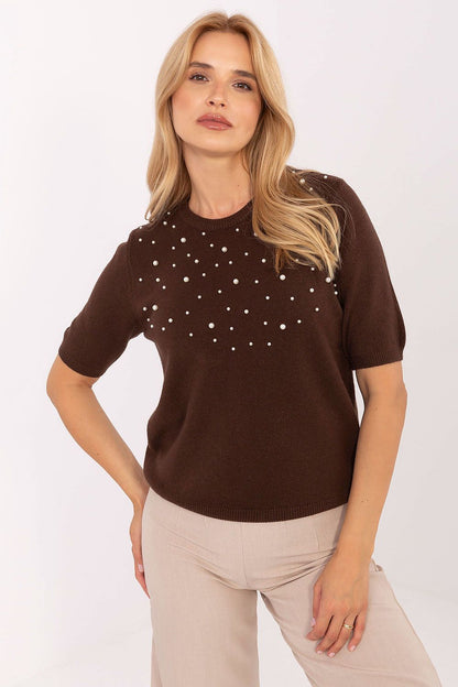 Close-up view of the decorative pearl details on a women's short sleeve sweater, a stylish piece by Factory Price in soft viscose blend.