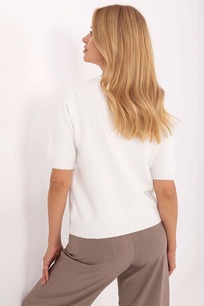 Styling idea featuring a soft viscose blend short sleeve sweater by Factory Price, paired with elegant trousers for a refined office outfit.