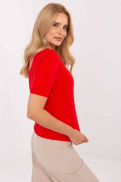 Stylish outfit featuring the Elegant V-Neck Short Sleeve Women's Sweater by Factory Price, paired with elegant trousers for a chic office look.
