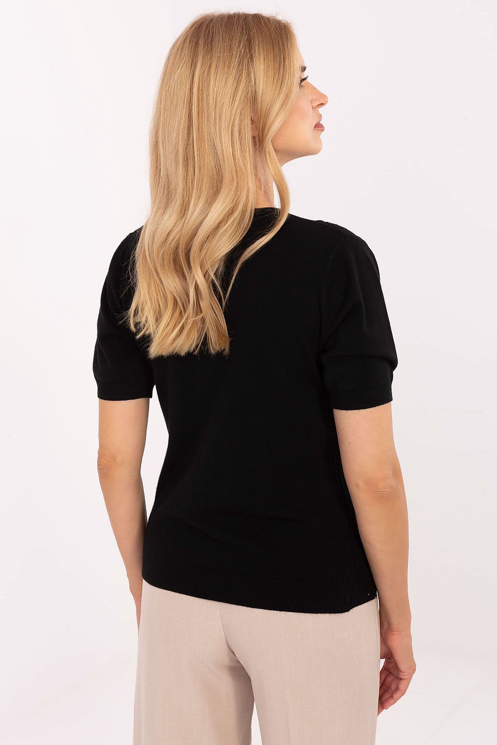 Close-up of the short sleeve V-Neck Women's Sweater by Factory Price, featuring intricate texture details reflecting sophisticated style.