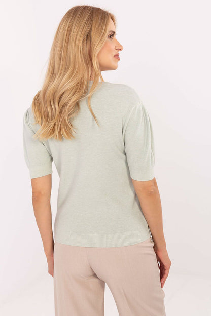 Trendy women's short sleeve sweater by Factory Price in S/M and M/L sizes, ideal for fashionable everyday style.
