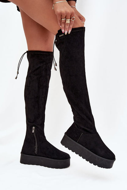 Step in Style luxury women's thigh-high boots in faux suede, featuring a fashionable platform and snug cuff for a perfect fit.