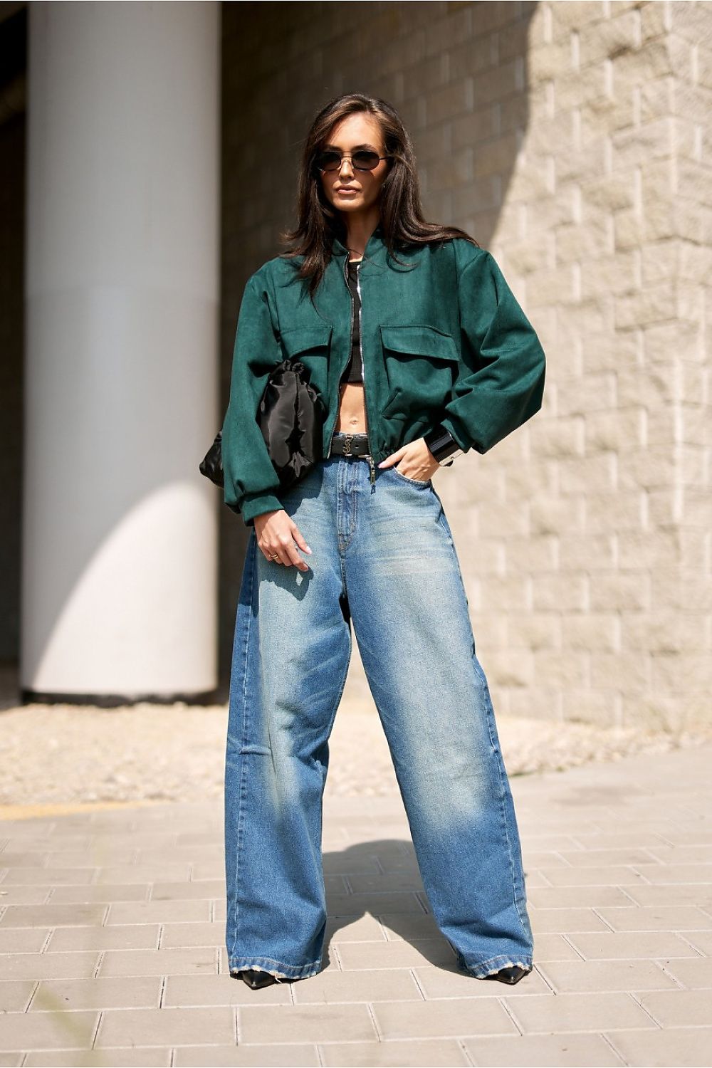 Detail shot of Roco Fashion's bomber jacket fabric, capturing the soft texture of the high-quality suede imitation material.