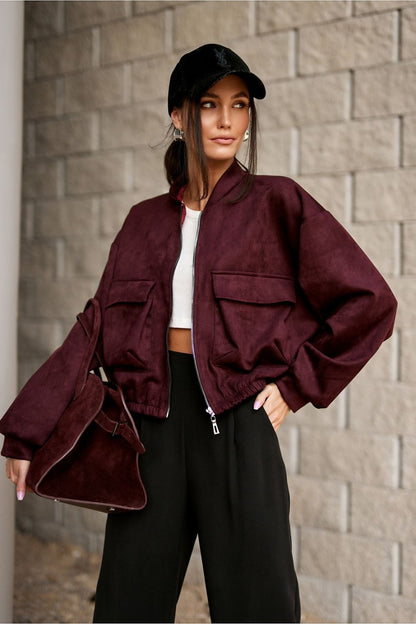 Elegant Roco Fashion oversized bomber jacket in soft suede imitation, showcasing a stylish urban design with a comfortable zipper closure and large pockets.