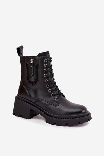 Elegantly designed Vinceza leather ankle boots with block heel and warm fleece interior, ideal for upscale winter style.
