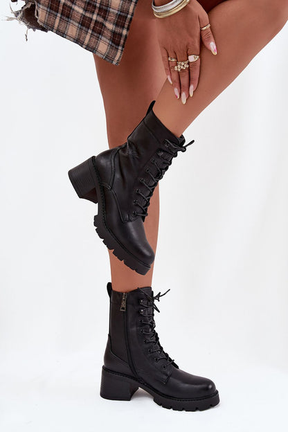 Stylish Vinceza women's ankle boots in artificial leather, designed with a stable block heel for a sophisticated and comfortable look.