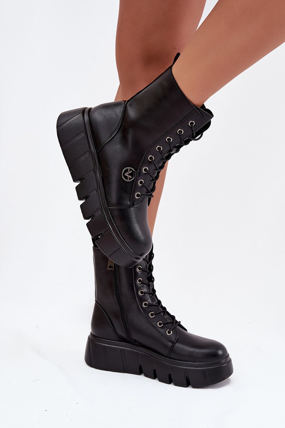 Side view of Vinceza women's ankle boots, emphasizing the 4cm platform and rounded toe design for a luxurious appeal.